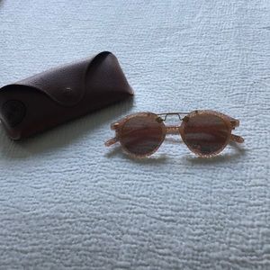 Krewe St. Louis round mirrored sunglasses.